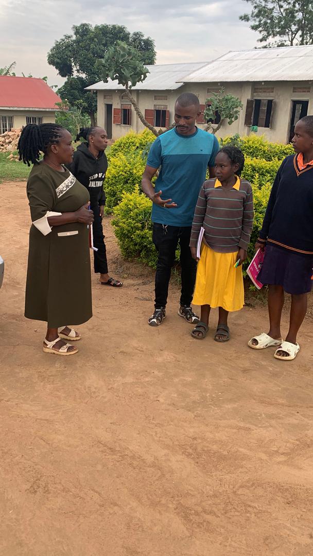 Children receiving educational materials